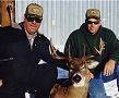 Garry Bass, left, with Tom Scheuneman of Michigan and his terrific 150 class whitetail.